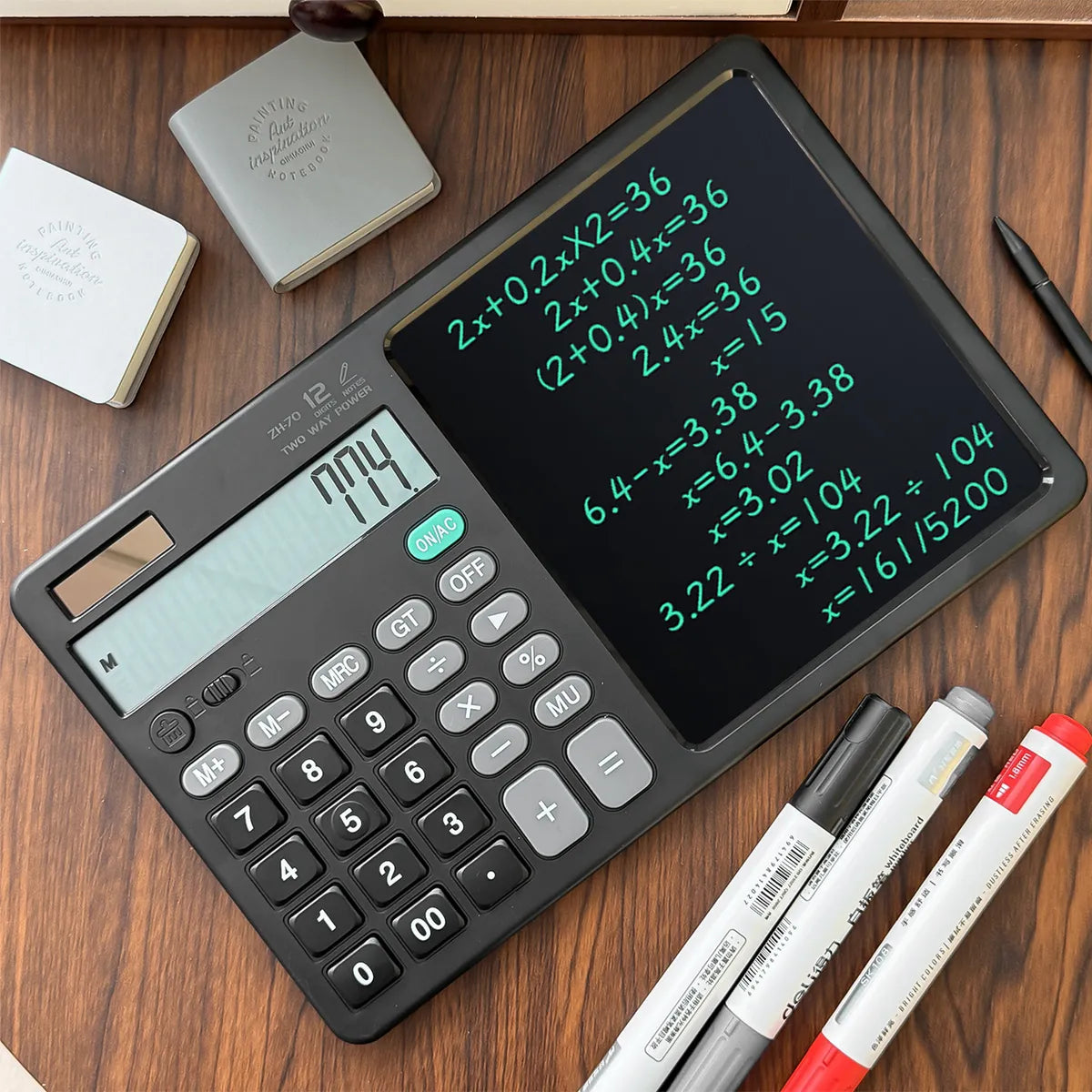 Calculatrice avec tablette d'écriture.